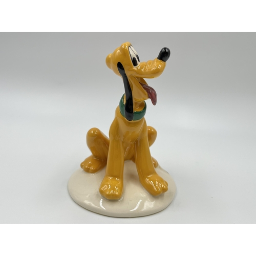 245 - A boxed Royal Doulton The Mickey Mouse Collection Pluto figurine - model no. MM6