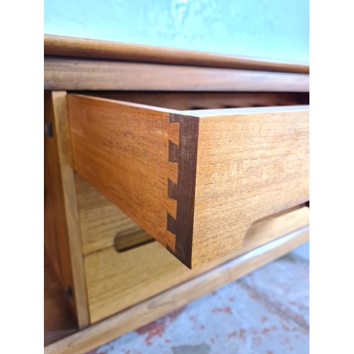 166 - A 1960s Younger Fonseca teak sideboard - approx. 75cm high x 210cm wide x 50cm deep