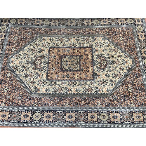 114 - A Persian style rug - approx. 200cm x 140cm