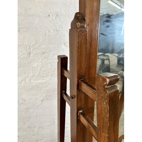 134 - An Arts and Crafts style mahogany cheval mirror - approx. 162cm high x 59cm wide x 60cm deep