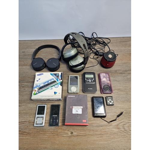 751 - A collection of headphones and portable media players to include boxed Samsung K3, Pure PocketDAB 15... 