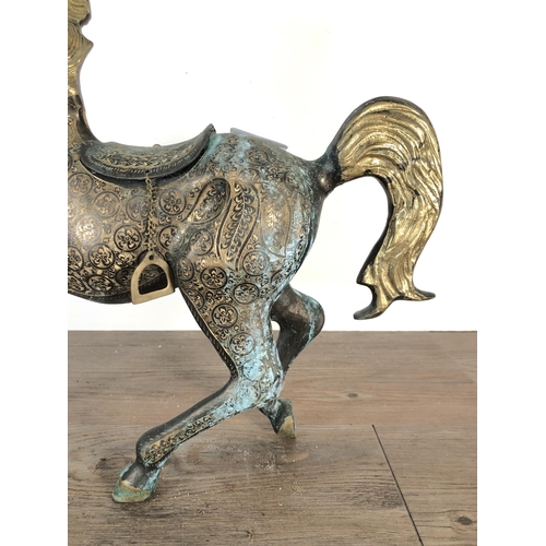 351 - A novelty brass, gilded and etched trotting stallion - approx. 39cm high x 38cm long