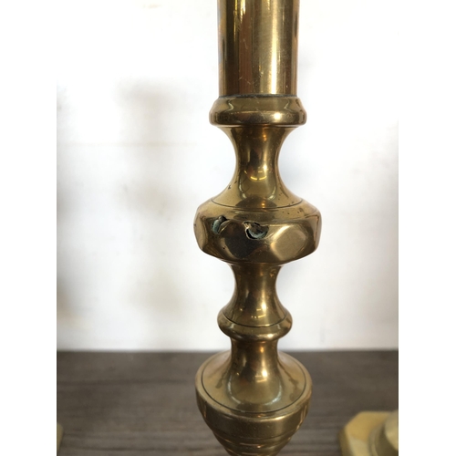 376 - Nine 19th century style brass candlesticks