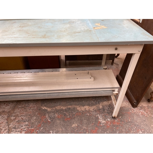 125 - Two static control work benches - approx. 105cm high x 181cm wide x 76cm deep