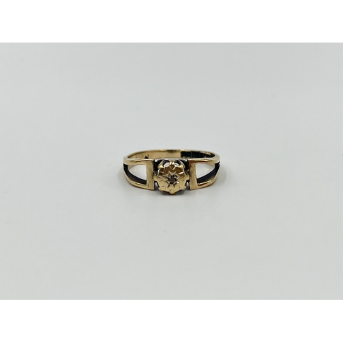 1154 - A hallmarked Birmingham 9ct gold open shouldered diamond solitaire ring, size M - approx. gross weig... 