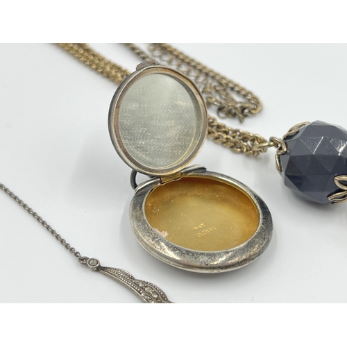 1158 - Five pieces of jewellery to include hallmarked Birmingham silver pendant compact mirror, sterling si... 