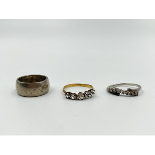 1159 - Five pieces of jewellery to include .925 silver half crown hammered ring, .925 silver CZ ring, rolle... 