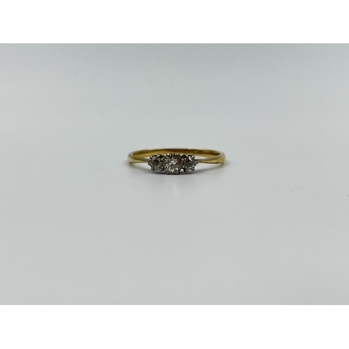 1161 - An 18ct gold and platinum diamond trilogy ring, size P½ - approx. gross weight 1.85 grams