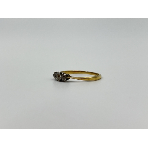 1161 - An 18ct gold and platinum diamond trilogy ring, size P½ - approx. gross weight 1.85 grams