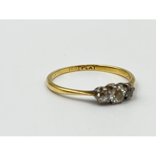 1161 - An 18ct gold and platinum diamond trilogy ring, size P½ - approx. gross weight 1.85 grams