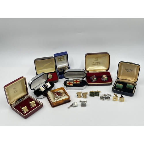 1163 - A collection of boxed cufflinks