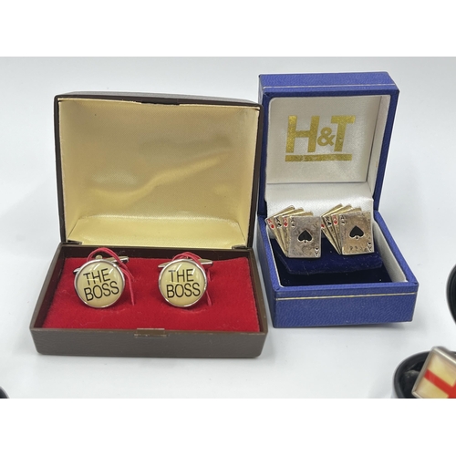 1163 - A collection of boxed cufflinks