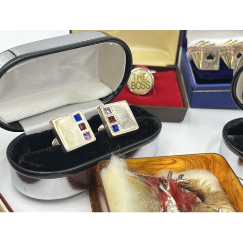 1163 - A collection of boxed cufflinks