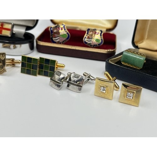 1163 - A collection of boxed cufflinks