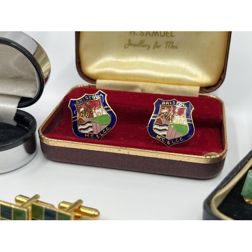 1163 - A collection of boxed cufflinks