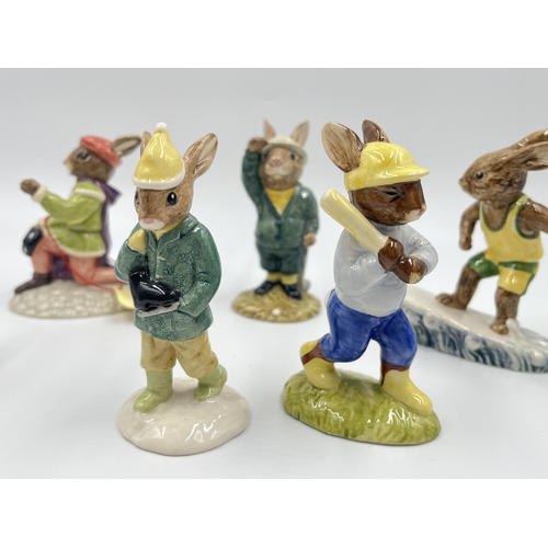 255 - Six Royal Doulton Bunnykins figurines to include Bogey Bunnykins DB32, Aussie Surfer Bunnykins DB133... 