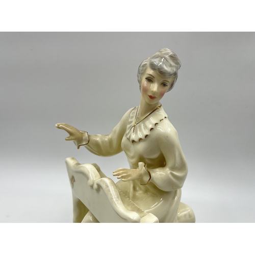 284A - A Royal Doulton The Enchantment Collection Musicale ivory bone china figurine - HN 2756