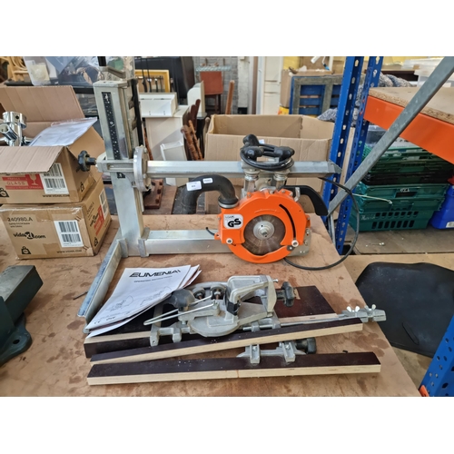 833 - A Eumenia Universal 240v radial arm saw with instruction manuals