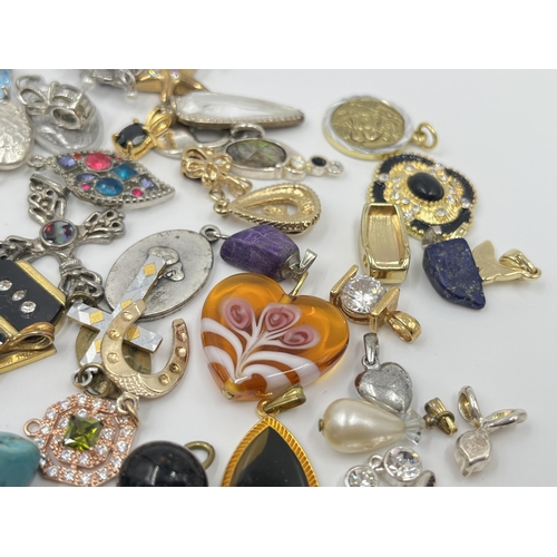 1164 - A collection of pendants