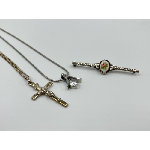 1166 - Five pieces of jewellery to include .800 silver crucifix pendant necklace, .830 silver chain necklac... 