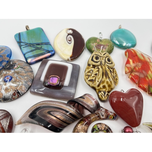 1168 - A collection of studio glass pendants