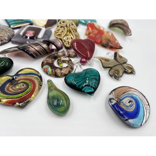 1168 - A collection of studio glass pendants