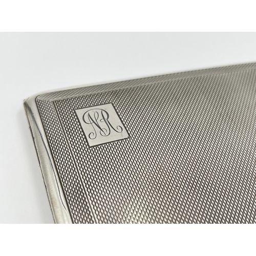 1229 - A Mayes, Mills & Co hallmarked Birmingham silver cigarette case, dated 1934 - approx. gross weight 9... 