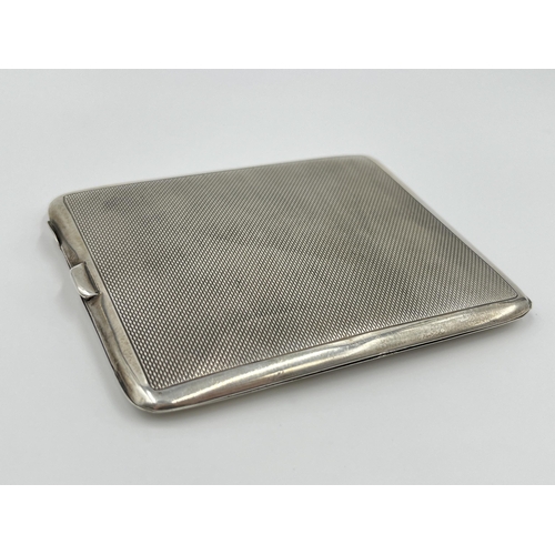 1229 - A Mayes, Mills & Co hallmarked Birmingham silver cigarette case, dated 1934 - approx. gross weight 9... 