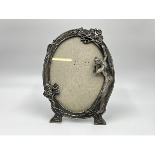 1233 - An Art Nouveau style pewter photo frame - approx. 21cm x 15cm wide