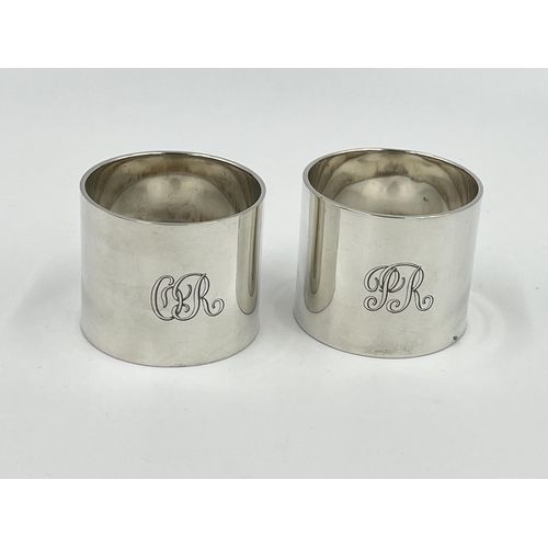 1235 - A cased pair of Ollivant & Botsford hallmarked Birmingham silver napkin rings, dated 1934 - approx. ... 