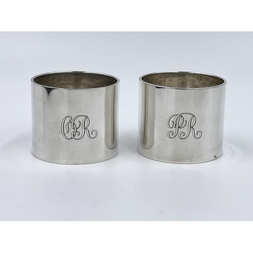 1235 - A cased pair of Ollivant & Botsford hallmarked Birmingham silver napkin rings, dated 1934 - approx. ... 