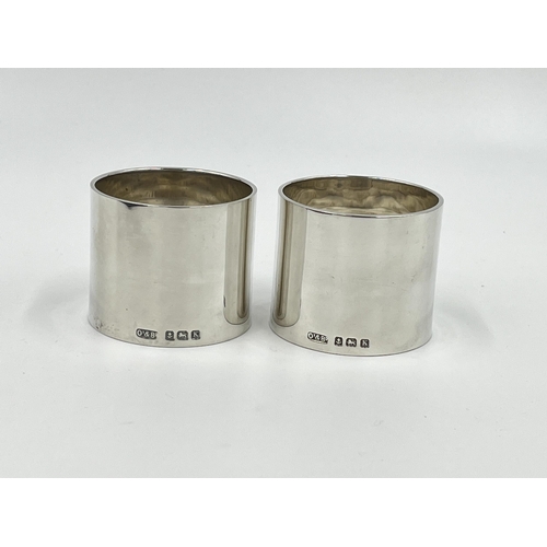 1235 - A cased pair of Ollivant & Botsford hallmarked Birmingham silver napkin rings, dated 1934 - approx. ... 