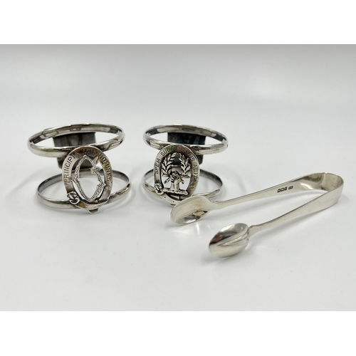 1237 - Three pieces of hallmarked sterling silver, one Edinburgh silver Ross Clan napkin ring dated 1896, o... 