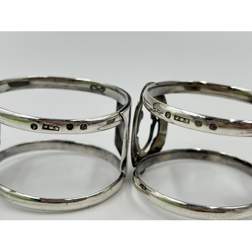 1237 - Three pieces of hallmarked sterling silver, one Edinburgh silver Ross Clan napkin ring dated 1896, o... 