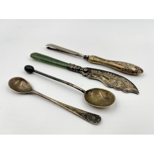 1240 - Four hallmarked sterling silver items to include silver handled tweezers etc.