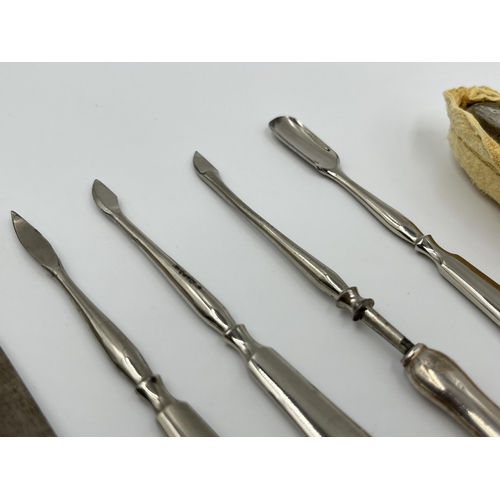 1244 - A cased R U & Co Ltd hallmarked Birmingham silver five piece manicure set and three further unmarked... 