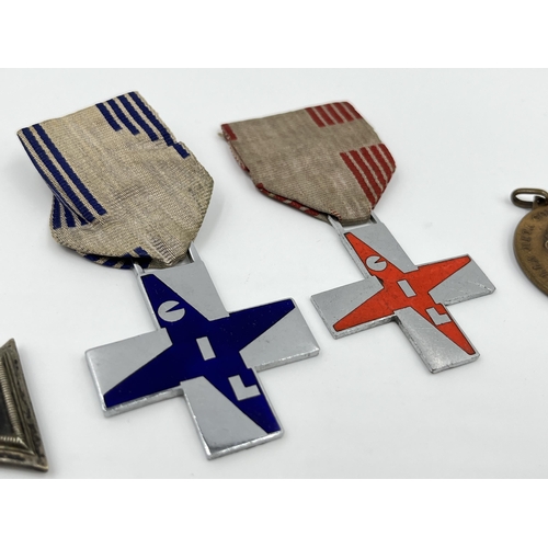 1263 - Four medals to include GIL crosses, German Iron Cross etc.