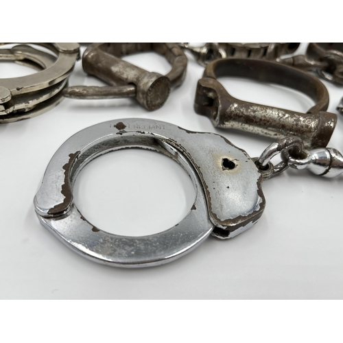 1267 - Six pairs of vintage handcuffs