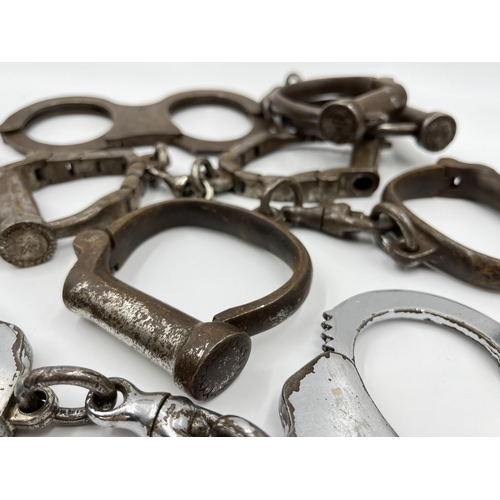 1267 - Six pairs of vintage handcuffs