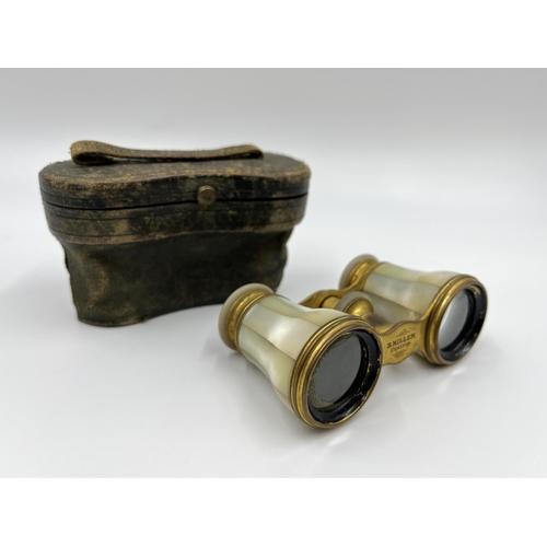 1274 - A leather cased pair of B. Miller Urmston brass and mother of pearl opera glasses