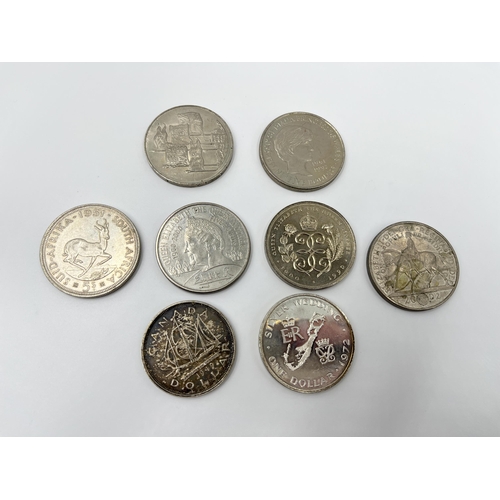 1277 - Eight large coins, one .500 silver 1951 South African 5 shillings, one .800 silver Canadian dollar, ... 