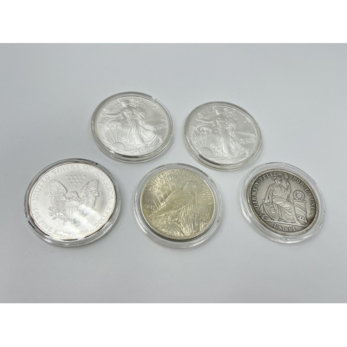 1281 - Five coins, three 2007 United States of America 1oz fine silver one dollars, one 1923 .900 silver Pe... 