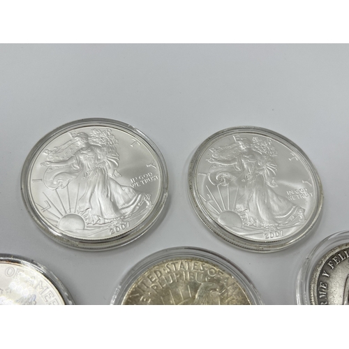 1281 - Five coins, three 2007 United States of America 1oz fine silver one dollars, one 1923 .900 silver Pe... 