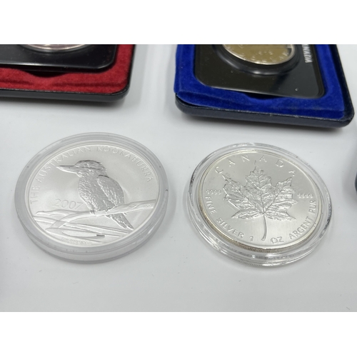 1290 - Six coins to include 1976 Montreal Olympics sterling silver 5 dollars, 2007 1oz fine silver 5 dollar... 