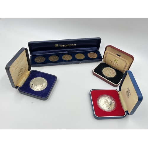 1294 - Eight coins to include 1977 Pobjoy Mint sterling silver proof one crown, 1977 Queen Elizabeth II Sil... 