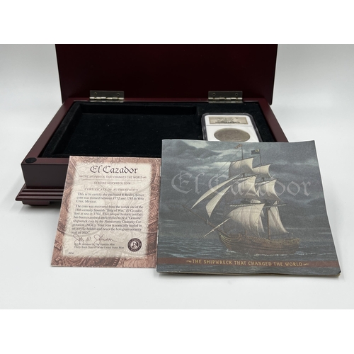 1299 - A boxed and sealed Carolus III (Charles III of Spain) eight reales .925 silver coin recovered from t... 