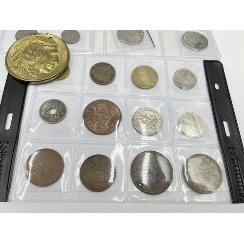 1300 - A collection of world wide coins to include six Elizabeth II Falkland Island penguin 50 pences, case... 