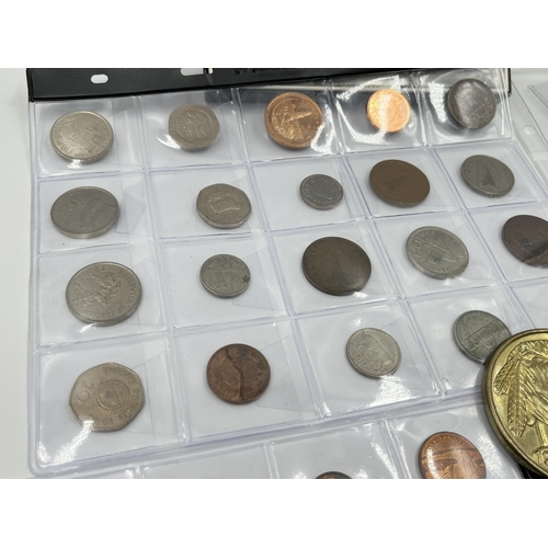 1300 - A collection of world wide coins to include six Elizabeth II Falkland Island penguin 50 pences, case... 