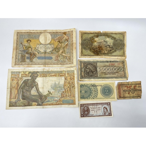 1301 - Seven world wide bank notes to include 1934 100 Francs, 1942 1,000 Francs, 1944 100,000 and 5,000,00... 