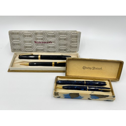 1305 - Two vintage boxed writing instrument sets, one Waterman's fountain pen with 14ct gold nib and propel... 